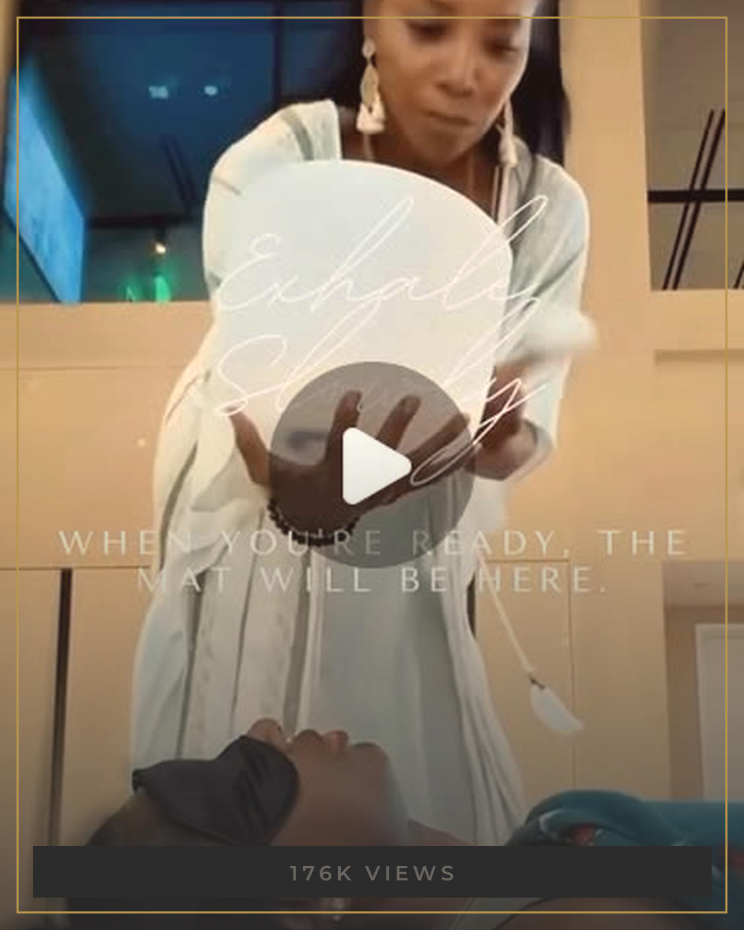 AUTHOR in a flowing white dress offering a sound healing session with a singing bowl