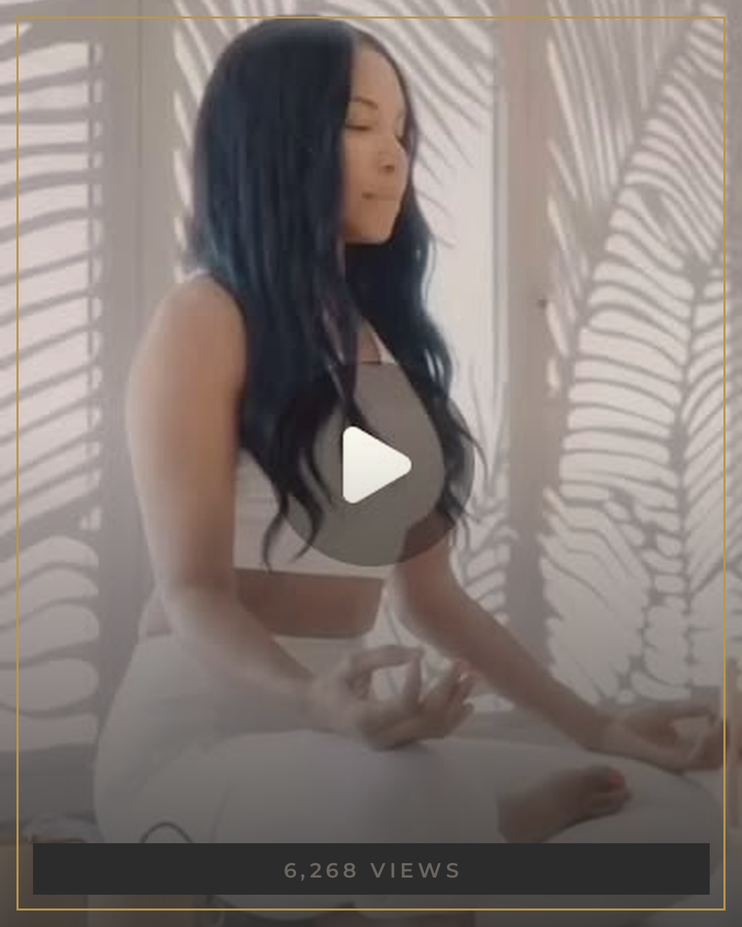 AUTHOR meditating in white activewear with palm shadow light